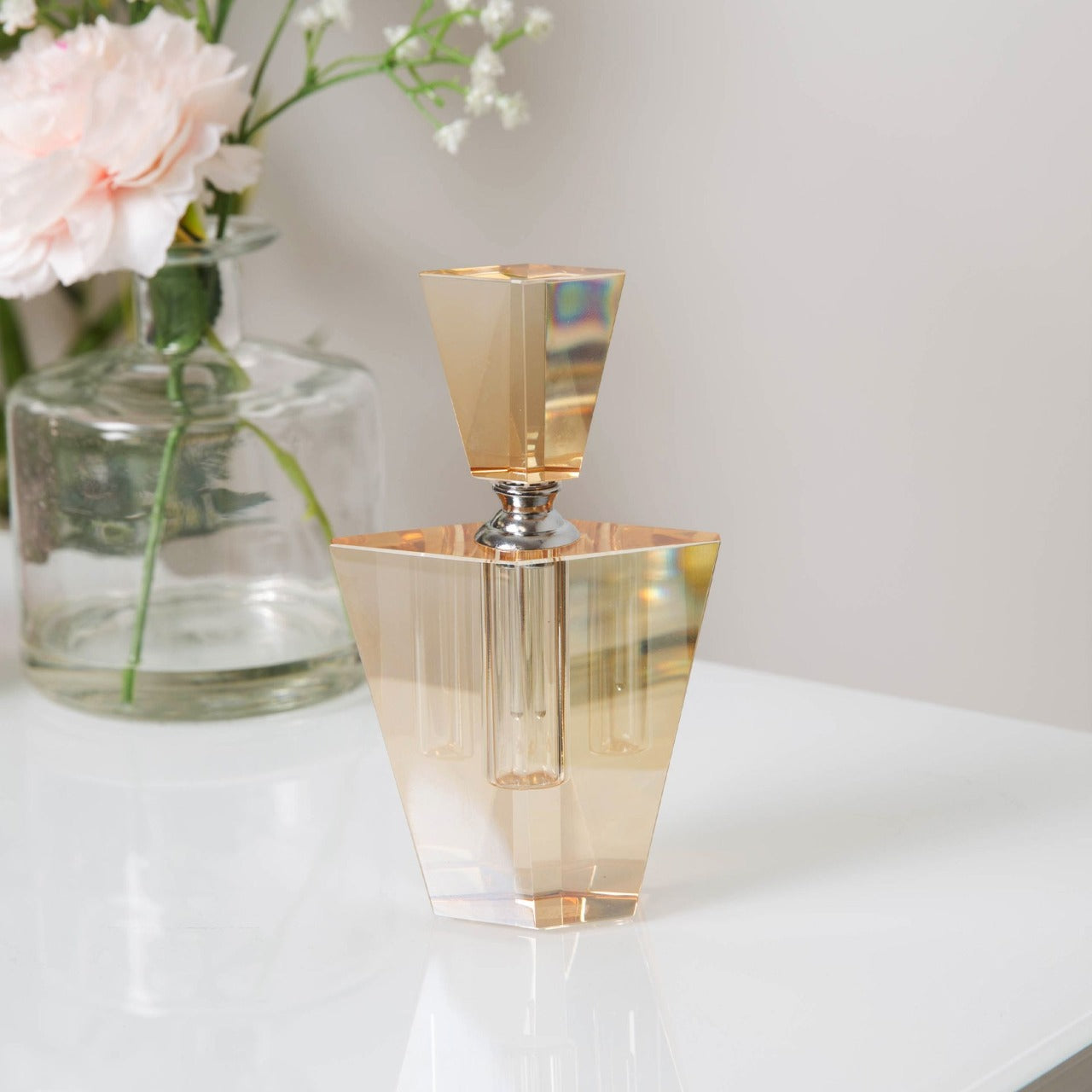 Estella Champagne Finish Glass Perfume Bottler Bring some art deco elegance to your dressing table with this heavy champagne gold glass perfume bottle. From Estella by SOPHIA® - Champagne Chic women's home and gift evoking the luxurious spirit of the art deco era.