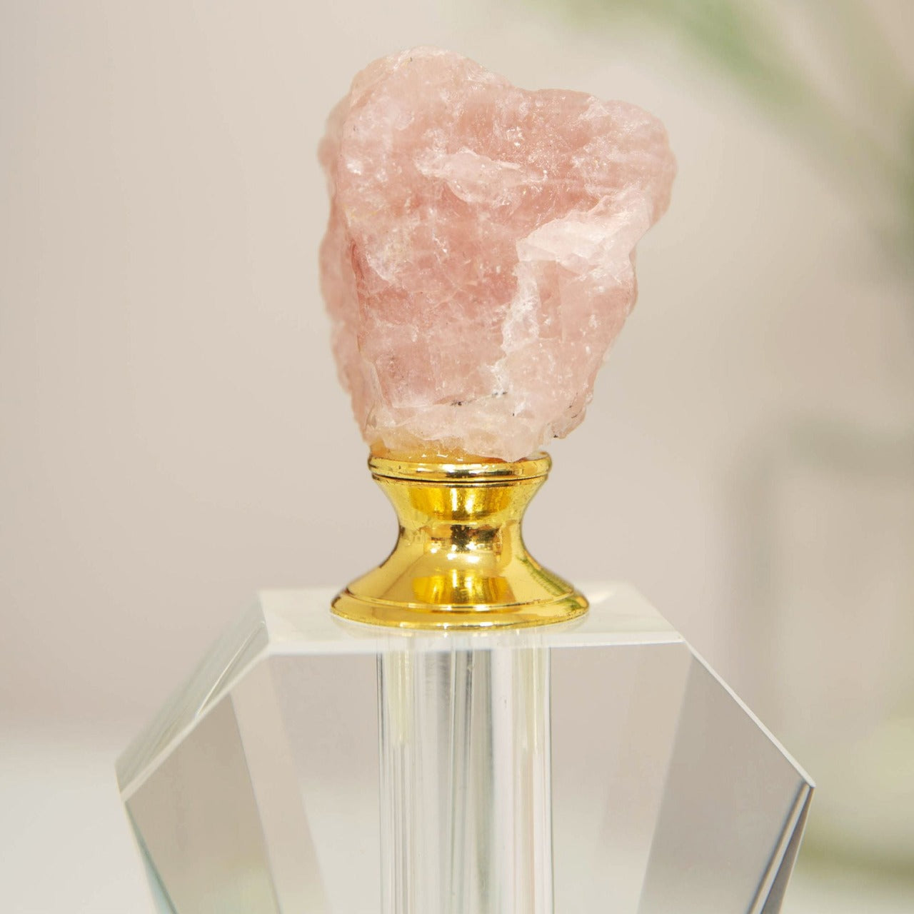 Estella Pink Stone & Glass Perfume Bottle A beautifully elegant cut crystal glass perfume bottle with pink rock crystal stopper top. From Estella by SOPHIA - Champagne Chic women's home and gift evoking the luxurious spirit of the art deco era.