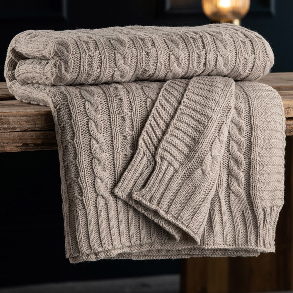 Galway Crystal Aran Knit Throw Cool Grey Our Aran Kit - Cool Grey Throw is every piece of luxury and warmth keeping you cosy all year round. This throw is a great addition to any bedroom or living space adding that perfect finishing touch.