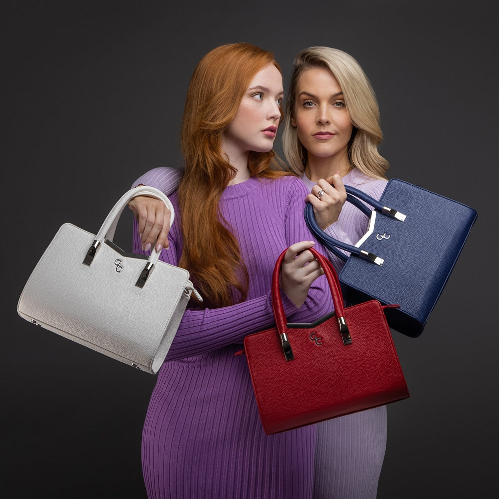 Galway Crystal Fashion Top Handle Handbag - Red Our stunning Red Top Handle Bag shouts class and sophistication with it's unique shape and style. A timeless accessory that will transform any outfit. This bag is modern, stylish, yet a classic piece.