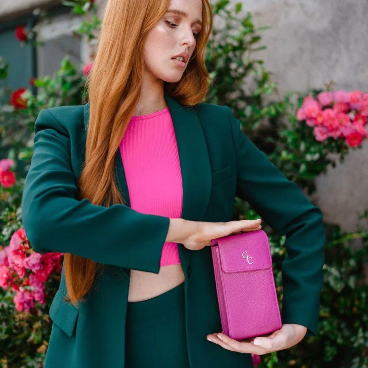 Galway Crystal Mini Cross Body Bag - Cerise Pink Introducing the new must have accessory that is truly functional. Our Light weight, Slim, Sleek, Crossbody bag is designed to hold the most essential accessory: Your mobile phone. There is nothing more liberating than carrying a lightweight bag that carries your essentials.