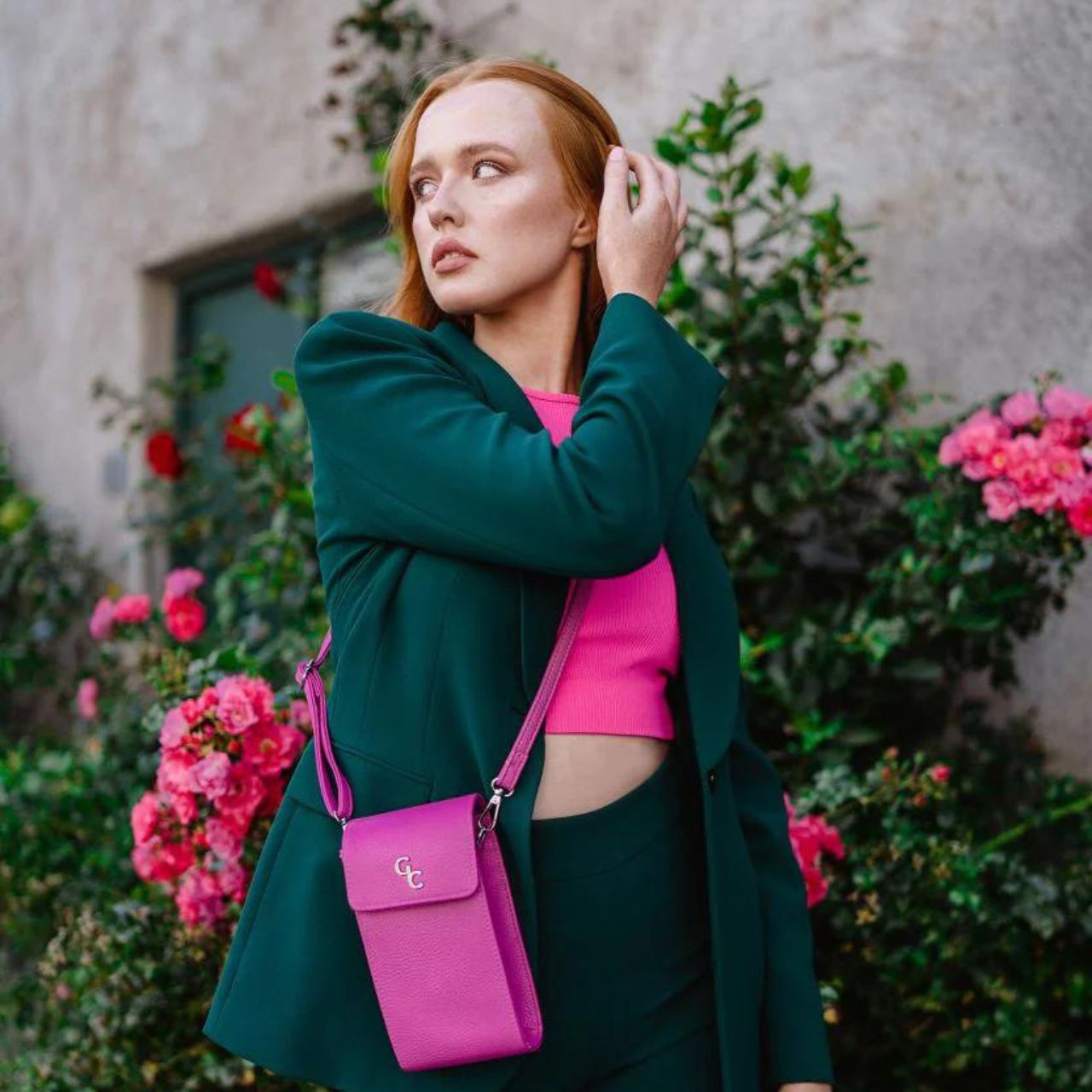 Galway Crystal Mini Cross Body Bag - Cerise Pink Introducing the new must have accessory that is truly functional. Our Light weight, Slim, Sleek, Crossbody bag is designed to hold the most essential accessory: Your mobile phone. There is nothing more liberating than carrying a lightweight bag that carries your essentials.