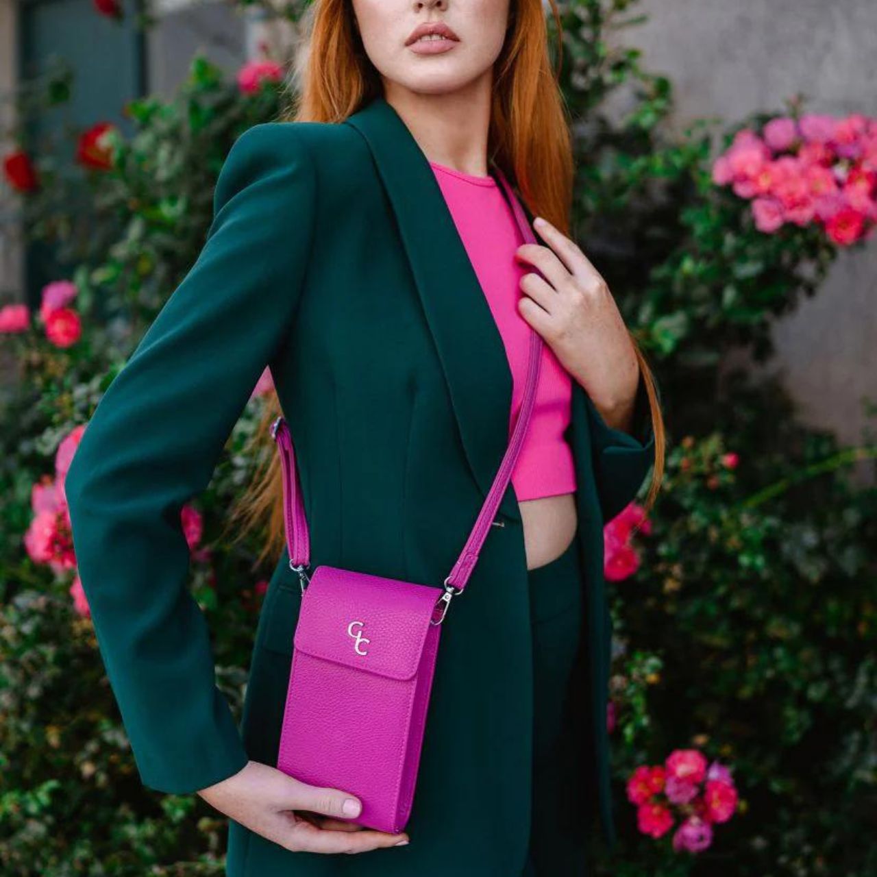 Galway Crystal Mini Cross Body Bag - Cerise Pink Introducing the new must have accessory that is truly functional. Our Light weight, Slim, Sleek, Crossbody bag is designed to hold the most essential accessory: Your mobile phone. There is nothing more liberating than carrying a lightweight bag that carries your essentials.