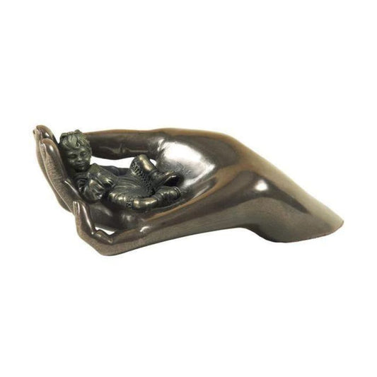 Genesis Caring Baby Girl  Beautifully crafted in cold cast bronze this wonderful baby figurine from the craftsmen of Genesis Fine Arts depicts the sleeping baby girl carefully curled up in a mothers caring hand.  This bronze piece is suitable to add a mahogany base with a few words of engraving to truly personalise this magnificent gift.