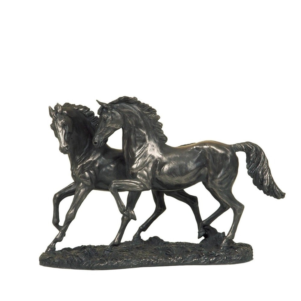 Genesis The Chase Entitled 'The Chase', this is a fine centerpiece for those fond of horses. Made from cold cast bronze and hand finished to perfection. Fully felted on the bottom to protect surfaces. A wonderful ornamental horse sculpture for the home.