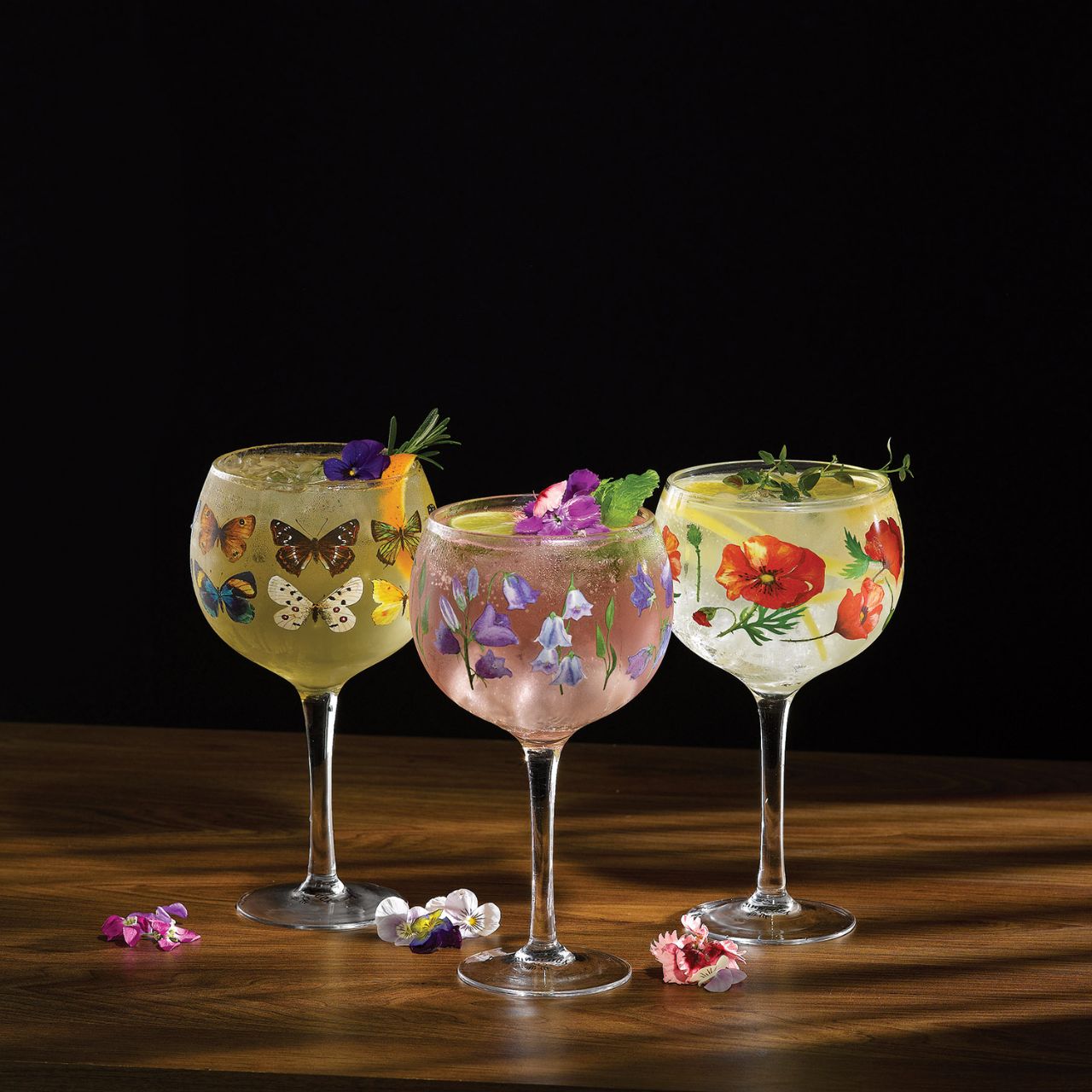 Ginology Butterflies Copa Gin Glass A gin glass fit for any social butterfly. Cheers to the beauty of nature, bright and beautiful, these butterflies will flutter right into your heart with each sip.