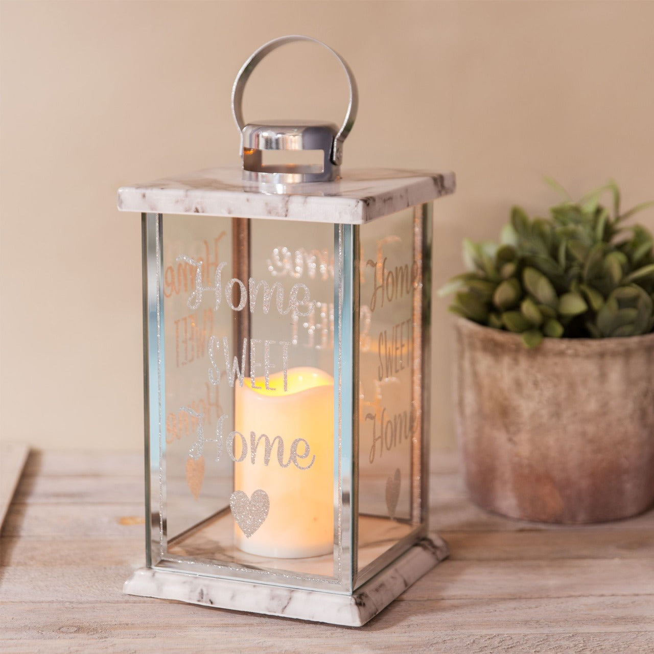 Hestia Glass Marble LED Candle Lantern A stylish LED candle lantern with marble effect detailing. From the Retreat collection from HESTIA® - Create a haven of soothing minimalism at home.