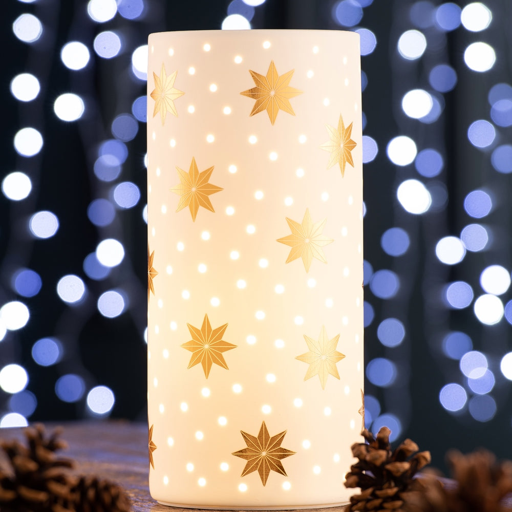 Gold Star Luminaire by Belleek Living Featuring luxurious gold stars, this luminaire is timeless and elegant. Belleek Living Luminaire lamps emit a soft warm glow highlighting the delicate surface decoration and piercing, creating beautiful mood lighting for your home.