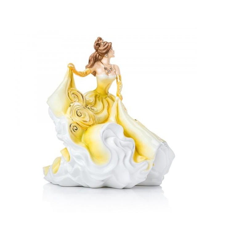 English Ladies Company Golden Charm  Our Golden Charm figurine is the latest addition to our English Ladies Figurines collection. The beautifully handcrafted figurine is decorated in sunshine yellow and hand-finished in real 22-carat gold. Her swirling skirt and flowing gown make her the belle of the ball.