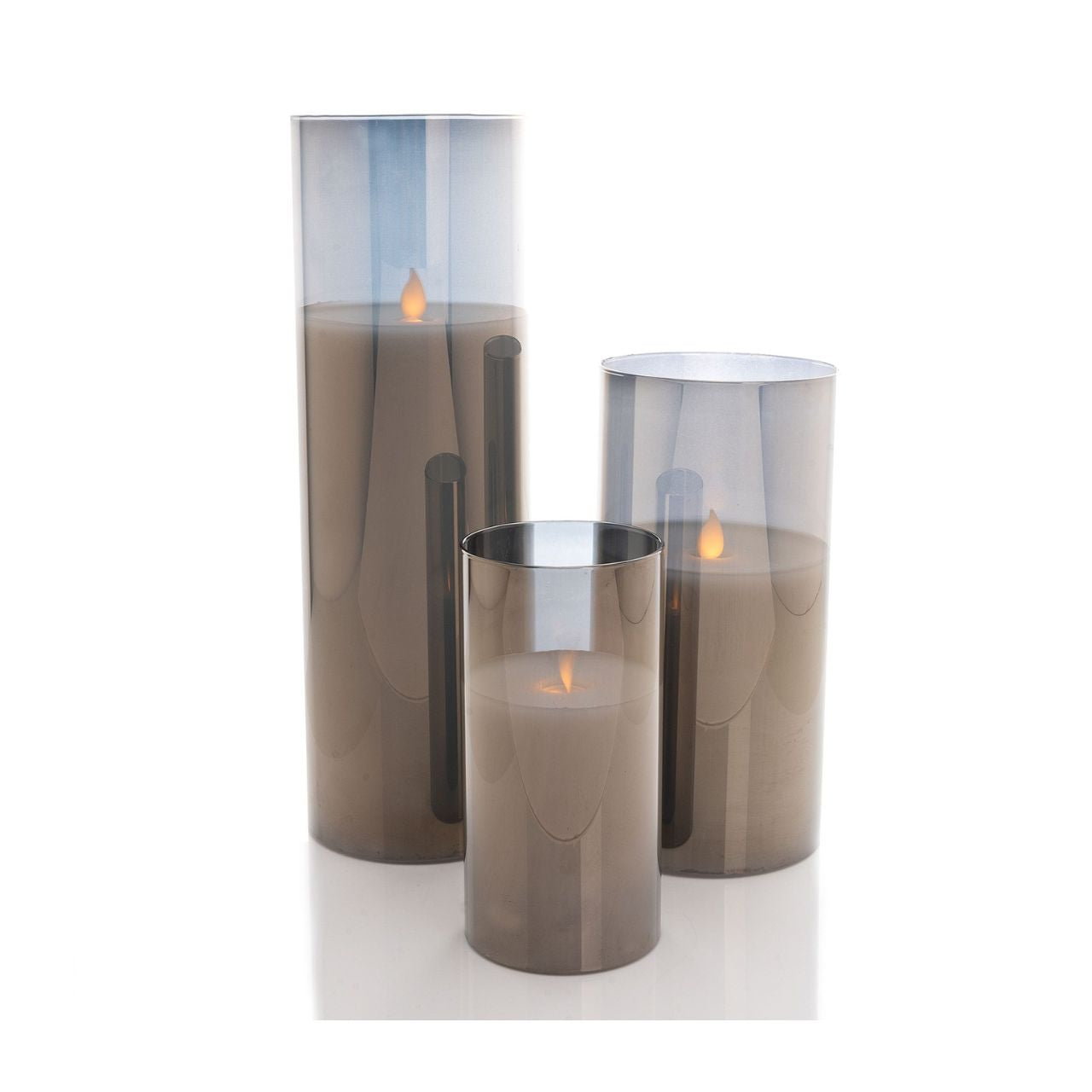 Grey Glass LED Candles Set of 3 Make your home a tranquil place with this set of 3 grey glass candles. Complete with LED flames, this lighting accessory is well-fitting for a family home.