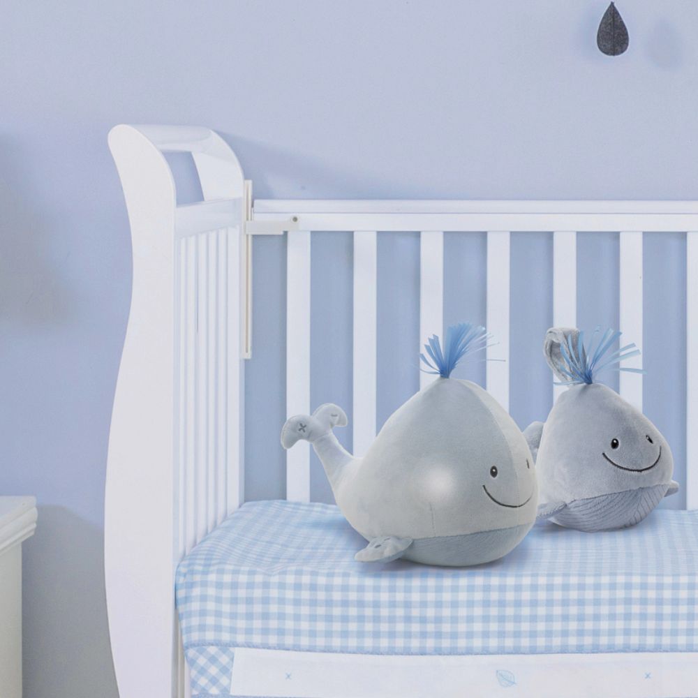 GUND Baby Sleepy Seas Light & Sound Whale  This musical plush toy will help your babies drift off to sleep. The whale is presented in an oh-so-soft light blue fabric, with blue ribbons for its hair, and dark embroidery creating a smiling face. Press the left fin and the animated whale splashes into life. Press the musical note on its right fin and the plush starts to play one of five different noises: Ocean Magic, Soothing Ocean Whale Sounds, Brahms' Lullaby, Bubbles or Ocean White Noise.