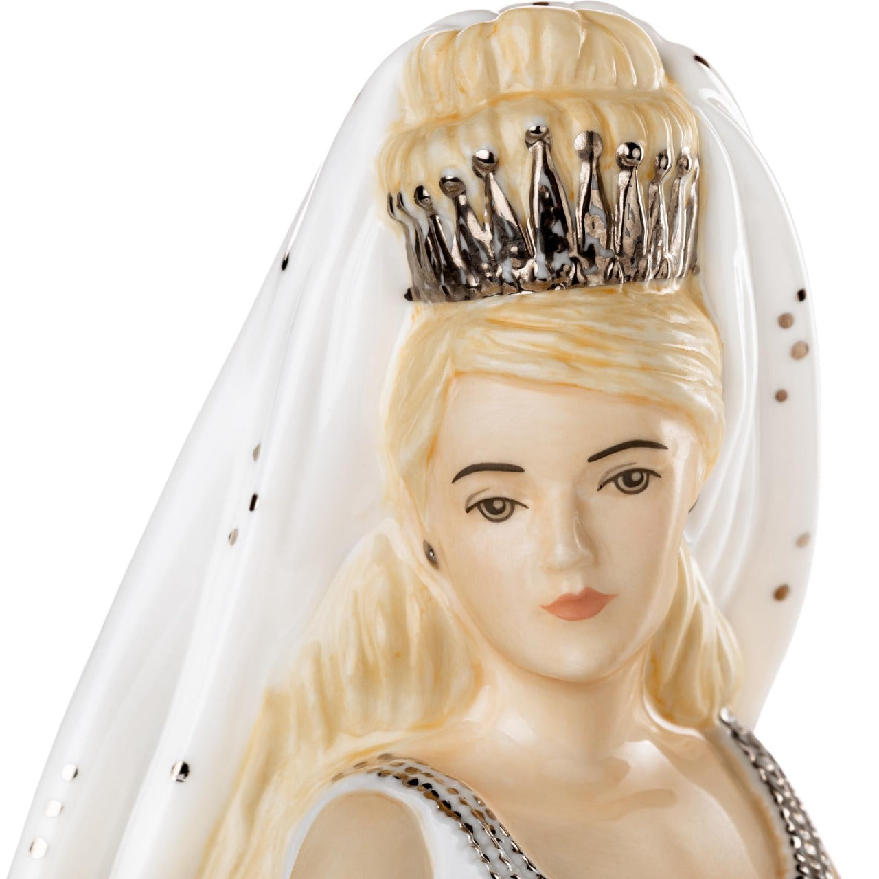 English Ladies Gypsy Affection Blonde Gypsy Affection is the latest edition to the range and comes in both blonde and brunette and also in mini-figures. This gorgeous figurine stands out from the crowd with stunning gold details throughout the dress and on her beautiful crown.