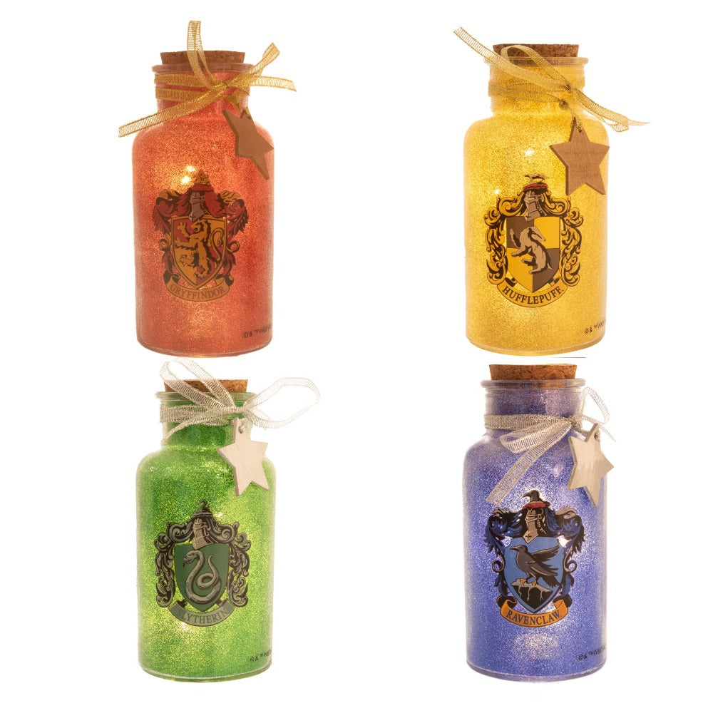Harry Potter LED Light Up Glass Jar House - Hufflepuff Lumos maxima! Light up your home this Christmas with these LED glass jar lights. With a glitter design and featuring all four houses, these accessories are sure to add a sprinkle of magic.