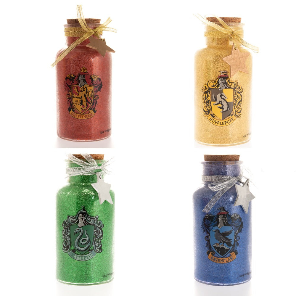 Harry Potter LED Light Up Glass Jar House - Slytherin Lumos maxima! Light up your home this Christmas with these LED glass jar lights. With a glitter design and featuring all four houses, these accessories are sure to add a sprinkle of magic.