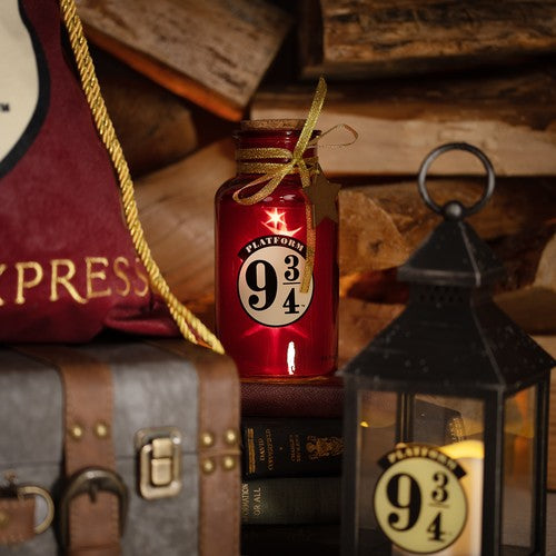 Harry Potter LED Light Up Jar Platform 9 3/4 Lumos maxima! Light up your home this Christmas with this LED glass jar light. With a glitter design, this fun accessory is sure to kick off your magical journey to Hogwarts.