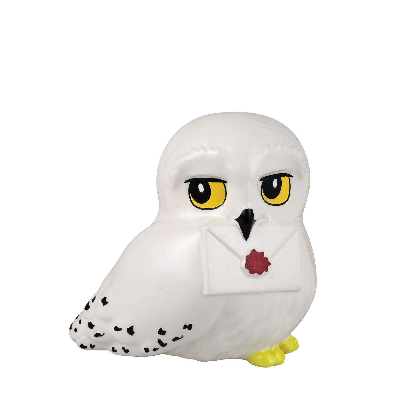 Sculpted Hedwig Money Bank This sculpted Hedwig money bank holds a Hogwarts letter in her beak. This cute Owl is based on Harry Potter's own pet that we see throughout the film franchise. With a coin slot hidden on the back of her head, this is the perfect gift for any fan, young or old.