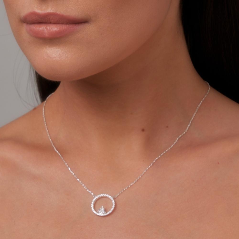 Knight & Day Heart & Circle Silver Necklace Silver plated Heart & Circle necklace richly encrusted with clear CZ in micro pave setting & embellished with heart shaped crystal. Length 16" + 2" extension.