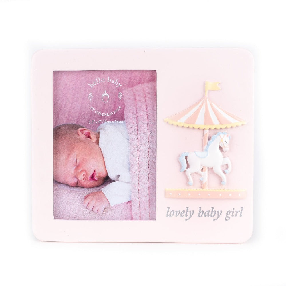 Hello Baby Frame Carousel Design 'Baby Girl' 3.5" x 5" Give a sweet photo pride of place with this adorable pink carousel design frame. With space for a portrait 3.5" x 5" image and a 'lovely baby girl' sentiment, this accessory makes a great gift for expecting parents.
