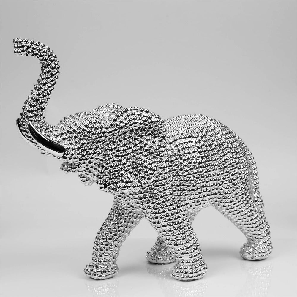 Hestia Diamante Elephant Bring an elegant touch of glamour to any space with this glittering silver diamante effect elephant figurine. From the HESTIA® Silver Luxe collection - unparalleled glamour, style and elegance in contemporary home and gift.