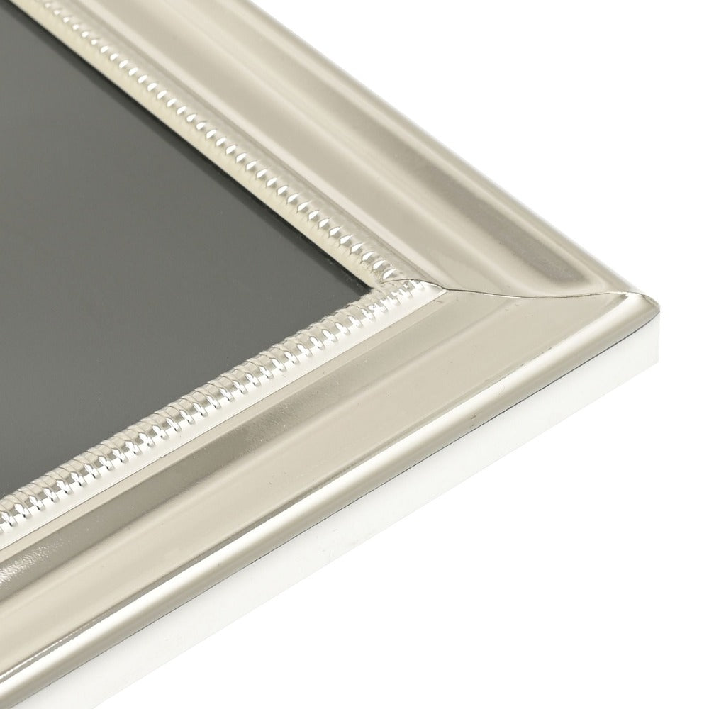 Impressions Silver-Plated Single Beaded Photo Frame 5" x 7" An elegant silver plated photo frame with scalloped edge and beaded aperture border. From IMPRESSIONS® - let your photos speak their thousands words.