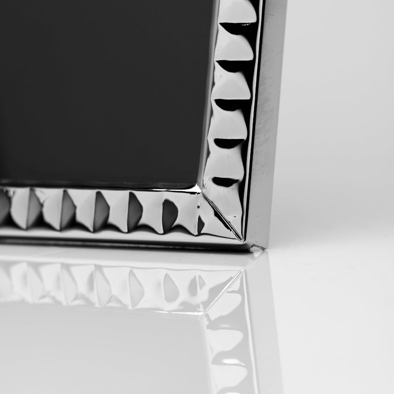 Impressions Silver Plated Diamond Textured Photo Frame 5" X 7"  Give a precious photo the perfect place to shine with this stylish silver plated photo frame. From Impressions - helping your precious pictures speak their thousand words.