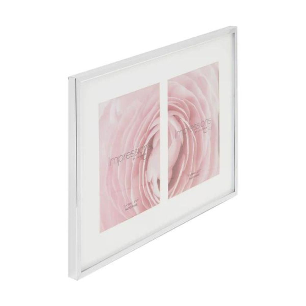 Impressions Silver Plated Double Photo frame 5" x 7"  A beautifully elegant silver plated photo frame with double 5" x 7" aperture from IMPRESSIONS® by Juliana. Complete with crisp white mount, luxury black velveteen standing strut and wall hook.