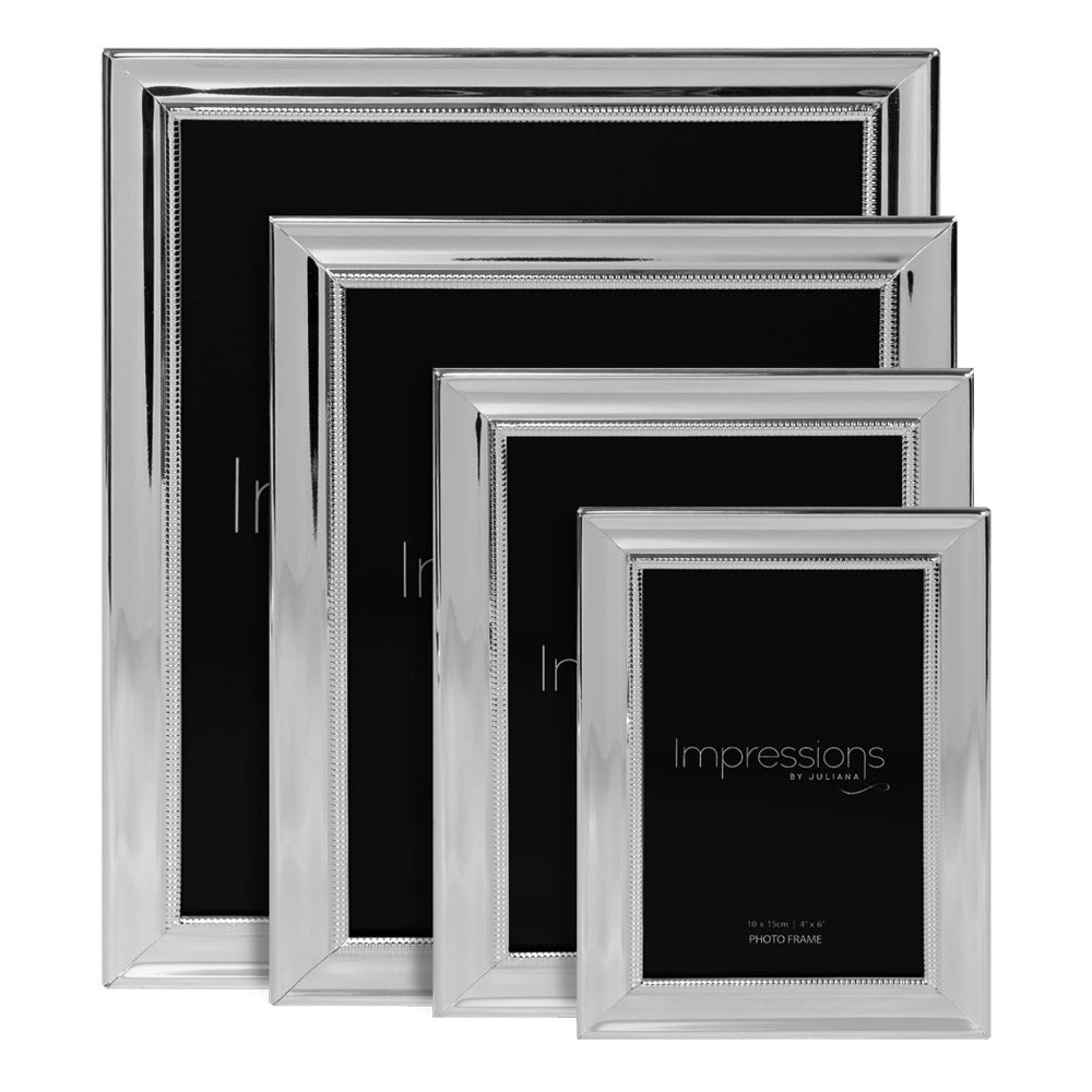 IMPRESSIONS Silver Plated Frame with Beaded Edge 6" x 8" An elegant silver plated photo frame with scalloped edge and beaded aperture border. From IMPRESSIONS® - let your photos speak their thousands words.