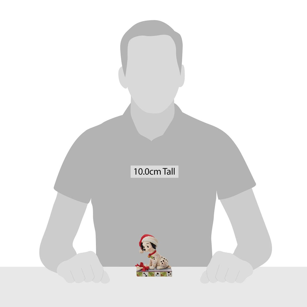 Jim Shore Christmas Lucky Personality Pose Figurine With one hundred and one brothers and sisters, Christmastime is a delight for Lucky. Enjoying the winter in London, Lucky savours a bone while he wears holly and a Santa hat decked out in Jim Shore's intricate detail.