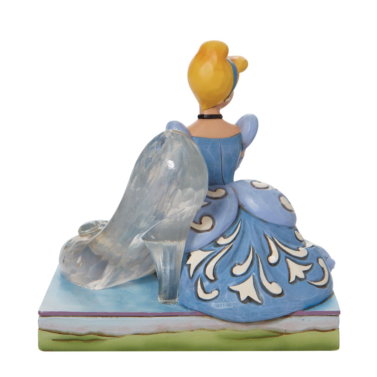 Jim Shore Disney Cinderella Glass Slipper Figurine This Disney Traditions line by Jim Shore features iconic Walt Disney princesses with their famous props highlighted. With a base illustrating her story, this piece features Cinderella in her brilliant blue gown with a glass slipper.