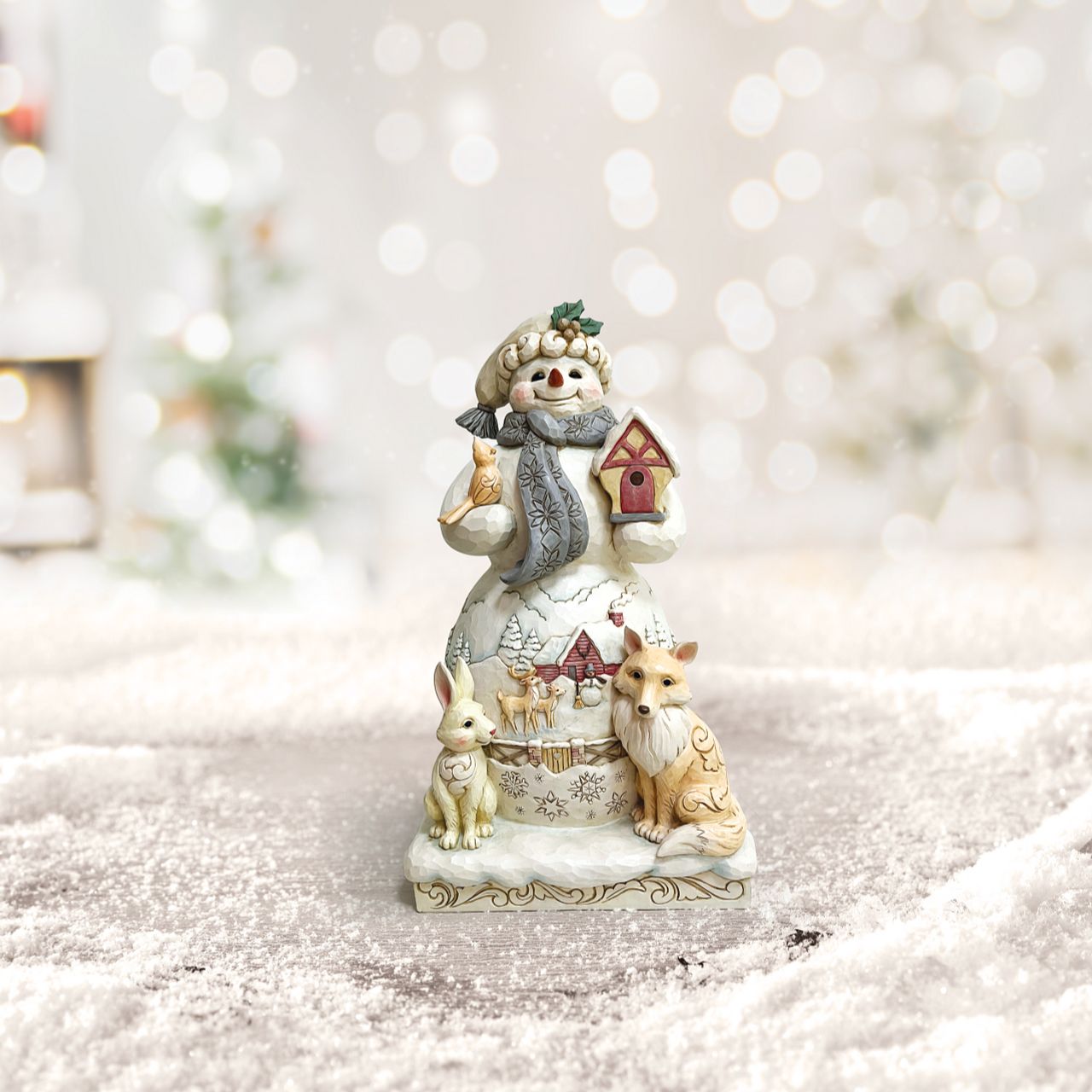 Jim Shore White Woodland Collection Snowman and Animals Statue  The White Woodland Collection showcases Intricate Jim Shore designs, with soft neutral colour palette suitable for many styles of home décor. This Statue size Snowman with woodland animals is the showstopper of this collection and would make the most delightful show stopping feature in any home.