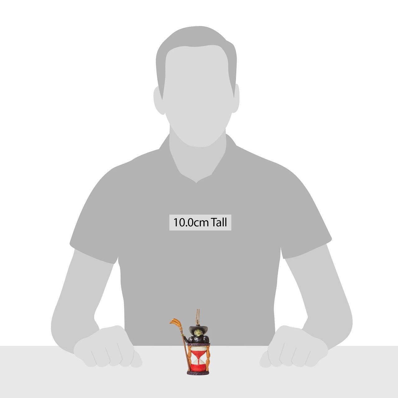 Jim Shore Wicked Witch with Hourglass Hanging Ornament Someone looks unhappy in this hourglass ornament. As the sands of time fall, the Wicked Witch frowns knowing it's only a matter of time until good wins the day. Place this green-faced miscreant into your tree and watch her moments before melting.