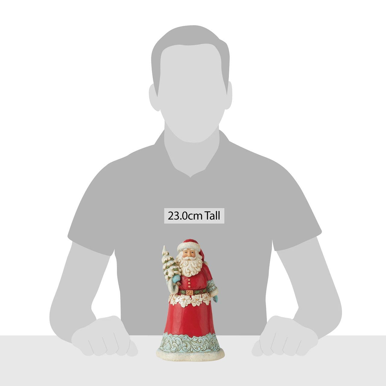 Winter Wonderland Collection Santa Figurine Holding Christmas Tree Winter Wonderland Collection; Bright jewel tones, metallic shimmering and pearlized finishes and coloured glitter accents. This striking Santa holding a glittering Tree is the perfect addition to any Winter Wonderland Collection.