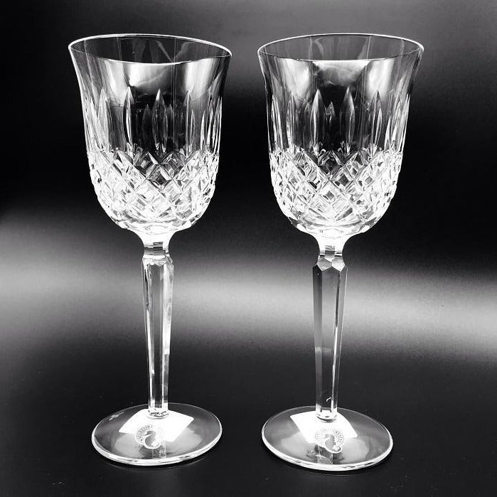 Waterford Crystal Kelsey Goblets Pair Kelsey Collection by Waterford is characterized by a simple demi-lune shape accented by an open diamond pattern and adorned with single wedge cuts.