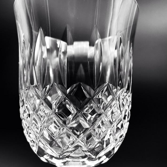 Waterford Crystal Kelsey Goblets Pair Kelsey Collection by Waterford is characterized by a simple demi-lune shape accented by an open diamond pattern and adorned with single wedge cuts.
