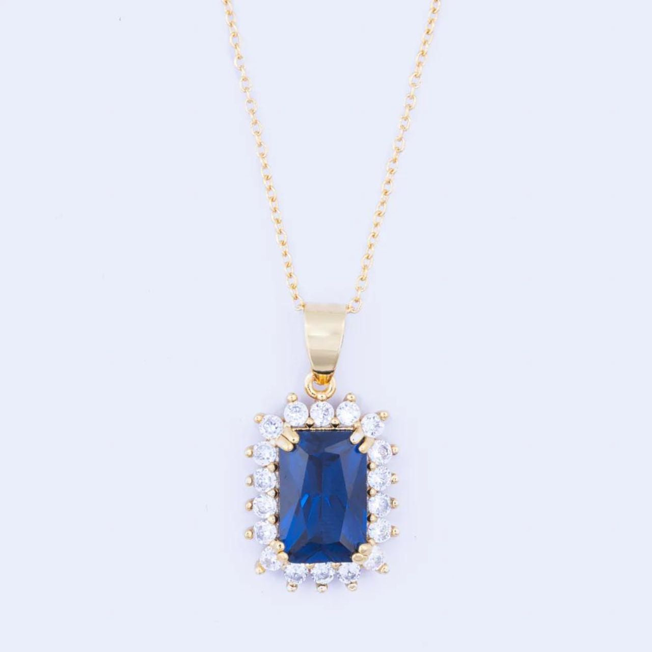 Knight & Day Classic Sapphire Pendant Classic style pendant with beautiful sapphire CZ centre stone. Gold plating. Length 42 + 5cm extension.