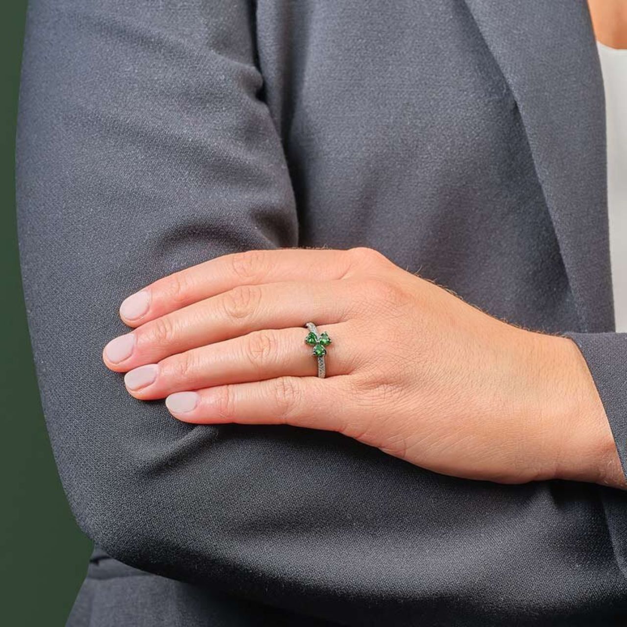 Sterling Silver Green CZ Shamrock Ring Our designers have created this unique sterling silver ring with a green crystal shamrock at the centre. It’s said that the shamrock was plucked from the land by St Patrick to explain his belief in the Trinity.