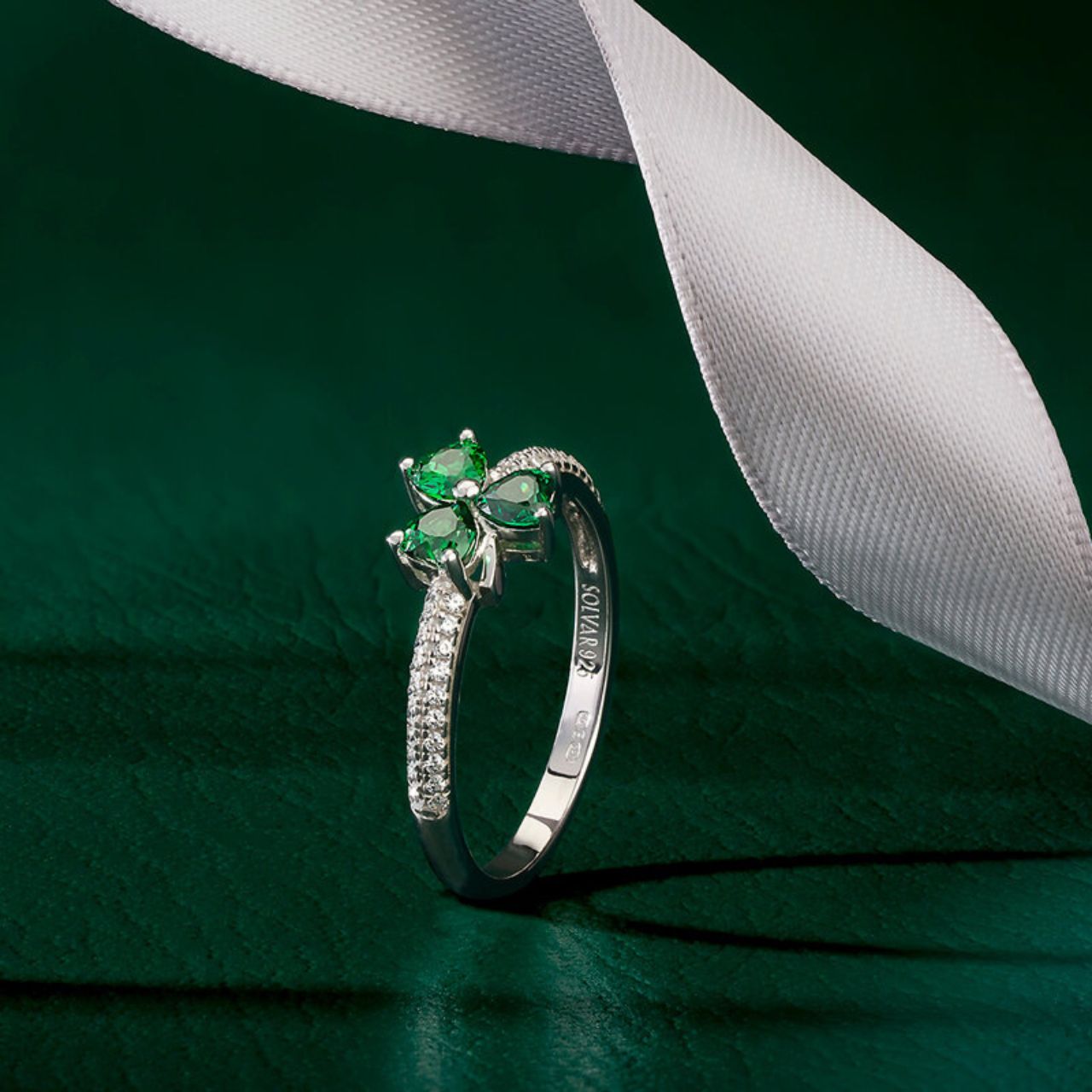 Sterling Silver Green CZ Shamrock Ring Our designers have created this unique sterling silver ring with a green crystal shamrock at the centre. It’s said that the shamrock was plucked from the land by St Patrick to explain his belief in the Trinity.