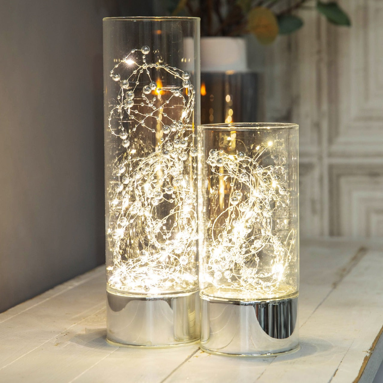 LED Tube Light 20cm Tall Bring some contemporary shimmer to your home with this elegant silver glass light tube. From the Silver Luxe collection by HESTIA® - unparalleled glamour, style and elegance in contemporary home and gift.