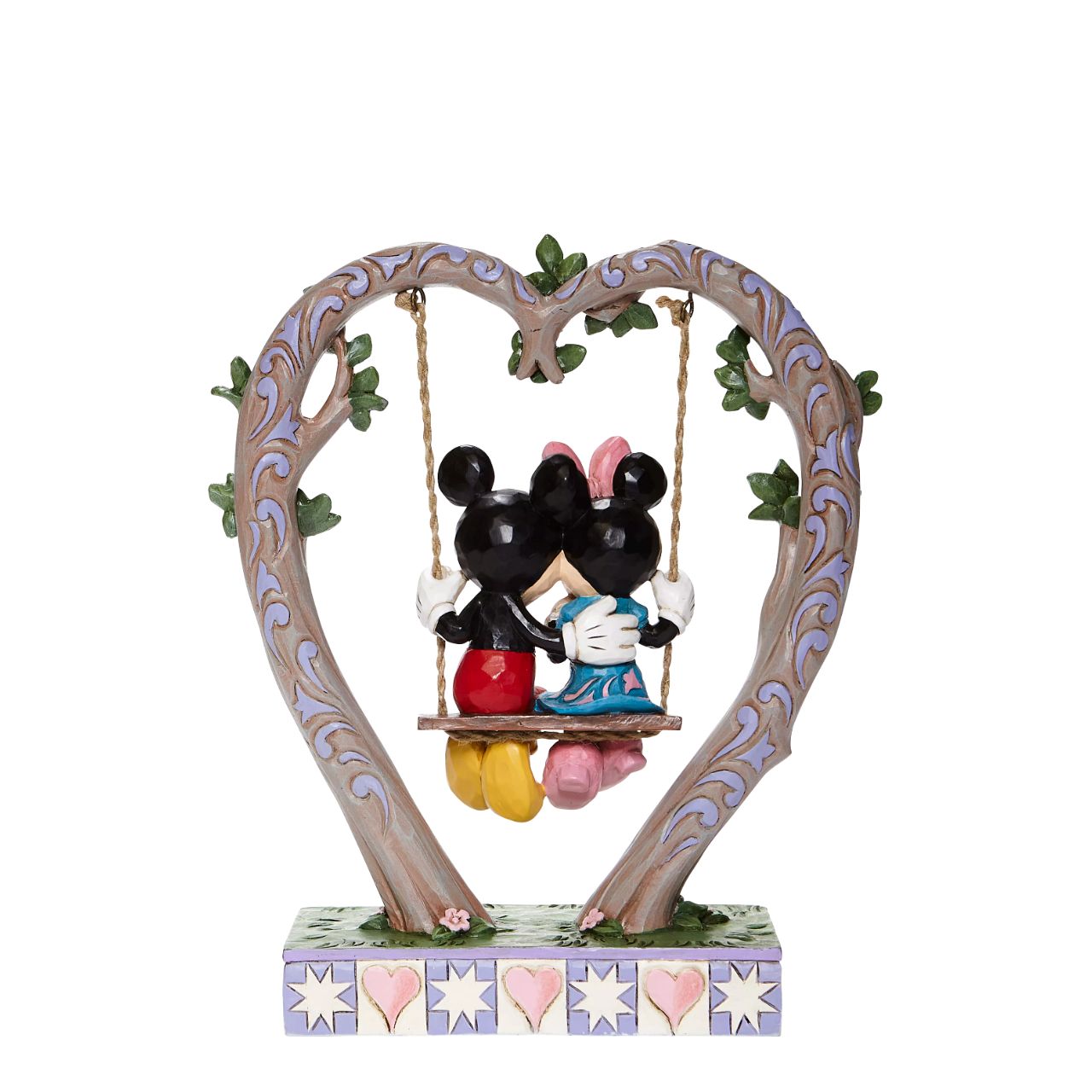 Jim Shore Sweethearts in Swing - Mickey and Minnie on Swing Figurine Suspended from a heart-shaped branch, a smitten Mickey and Minnie swing into Spring in this quintessentially romantic Jim Shore sculpture.