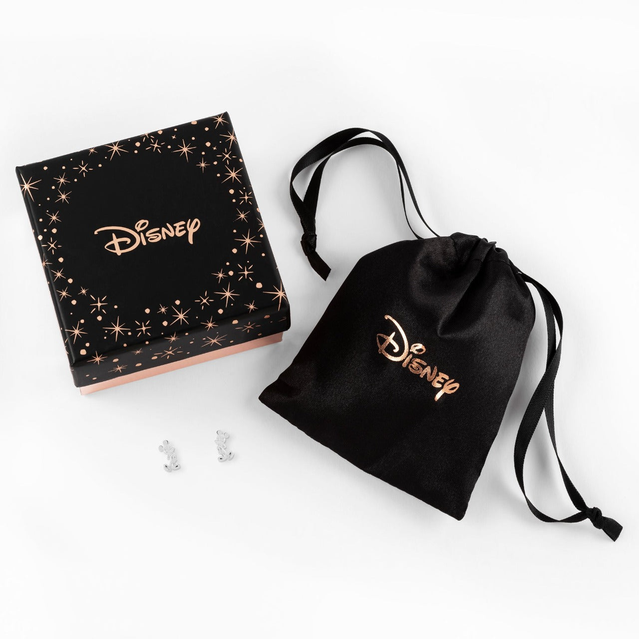 Disney Mickey Mouse Silver Stud Earrings Stunning sterling silver stud earrings form a silhouette of Micky Mouse famous pose adding a feminine touch to the classic piece of jewellery Trendy and fashionable design, the Disney Micky Mouse famous pose Sterling Silver Stud Earrings add a chic, fun touch to any outfit.