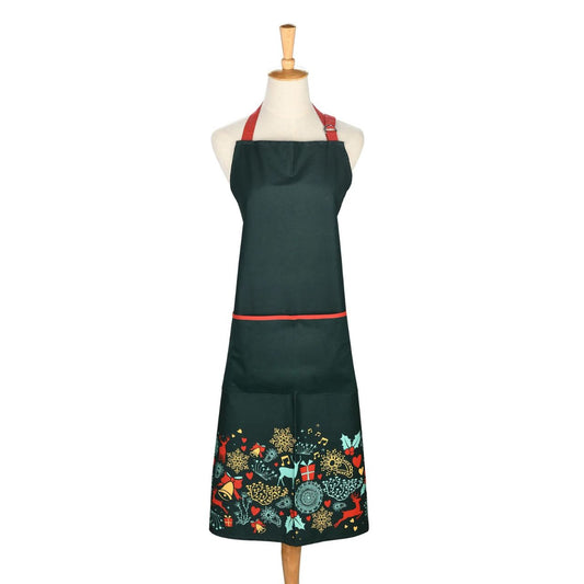 A Christmas Wish Apron by Mindy Brownes Interiors  A beautiful apron finished in forest green with a Christmas design that depicts some of Christmas' key elements, such as reindeer, presents, music notes, and more.  A stylish, yet practical way to avoid any outfit mishaps while baking and cooking this Christmas season.