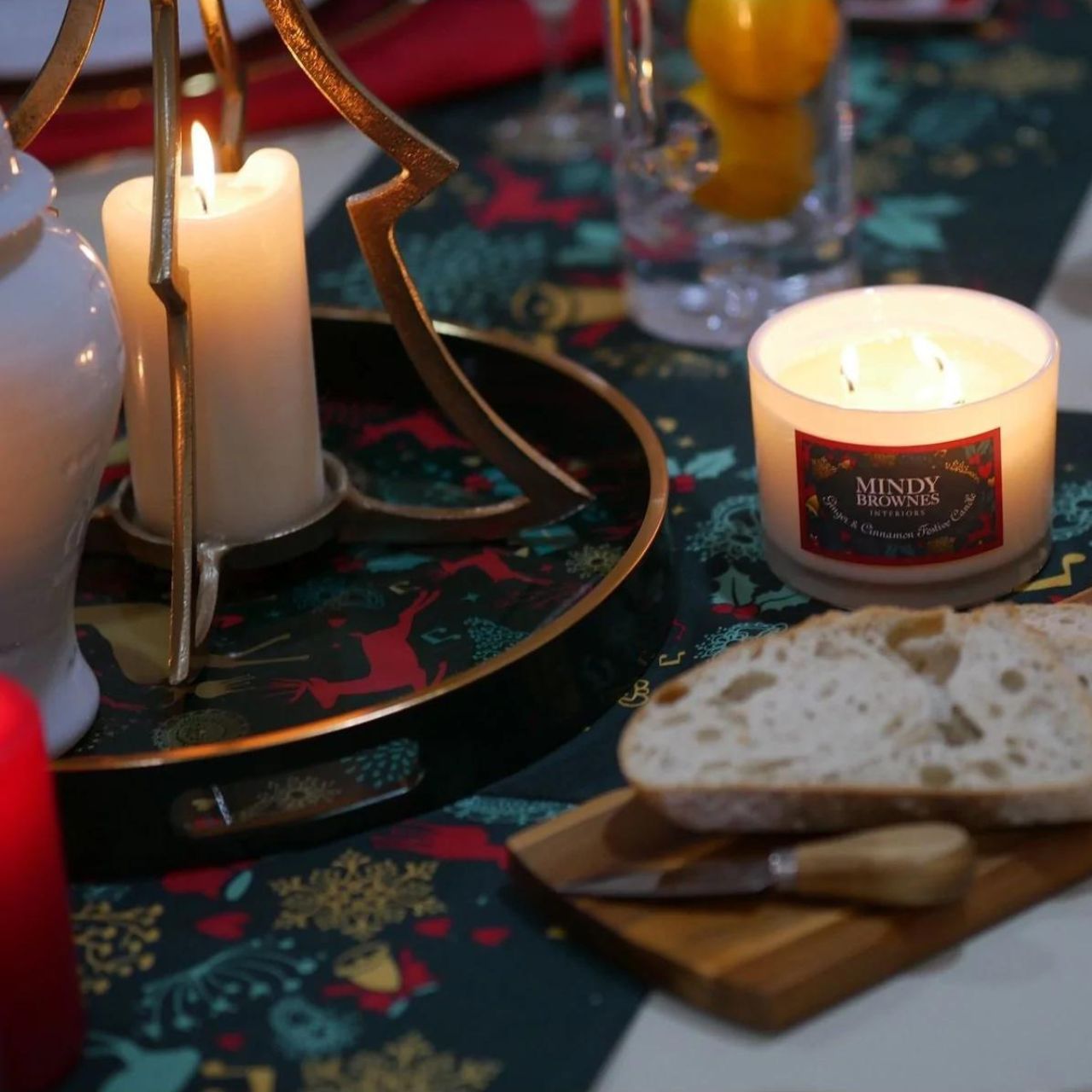 A Christmas Wish Tray by Mindy Brownes Interiors  A stunning circular tray, with a rich green surround, gold rim, and a Christmas design that features some of Christmas' key elements, such as reindeer, presents, music notes and more. An ideal styling accessory this Christmas season.