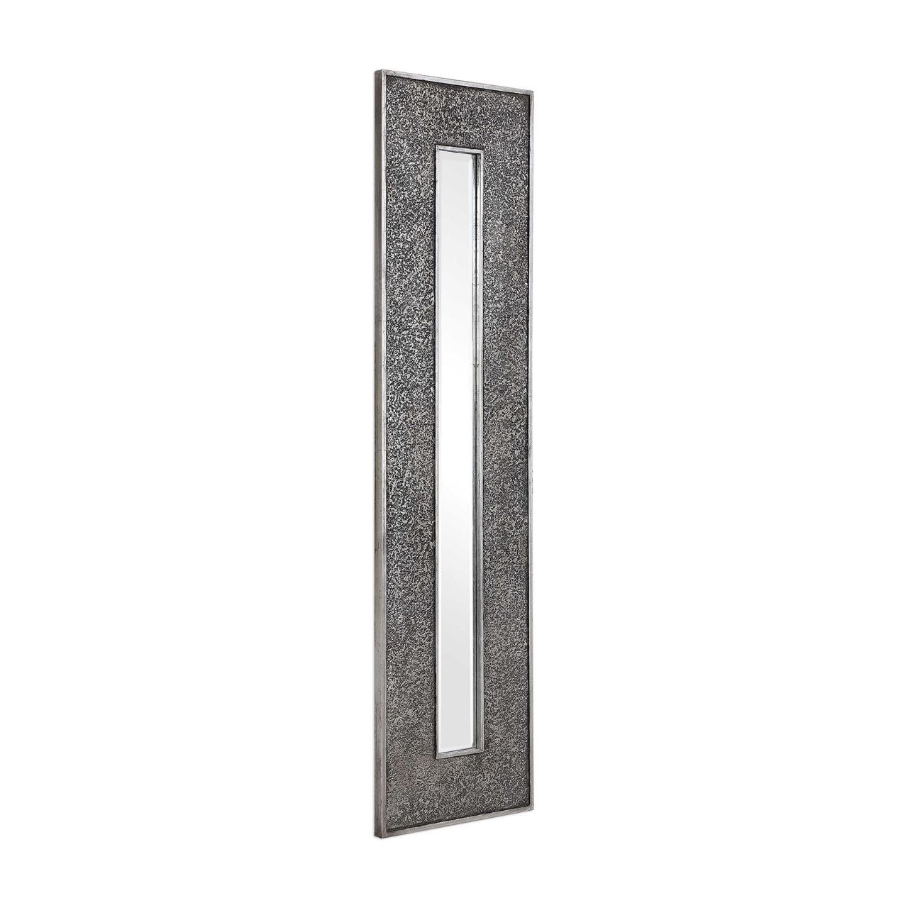 Bannon Mirror by Mindy Brownes - NEW This rectangular mirror features a heavily textured surface finished in a metallic silver leaf with a heavy charcoal wash over a solid wood construction. This contemporary design boasts a great profile for showing individually or multiple for a bold statement. The mirror is bevelled and can hang vertically and horizontally.