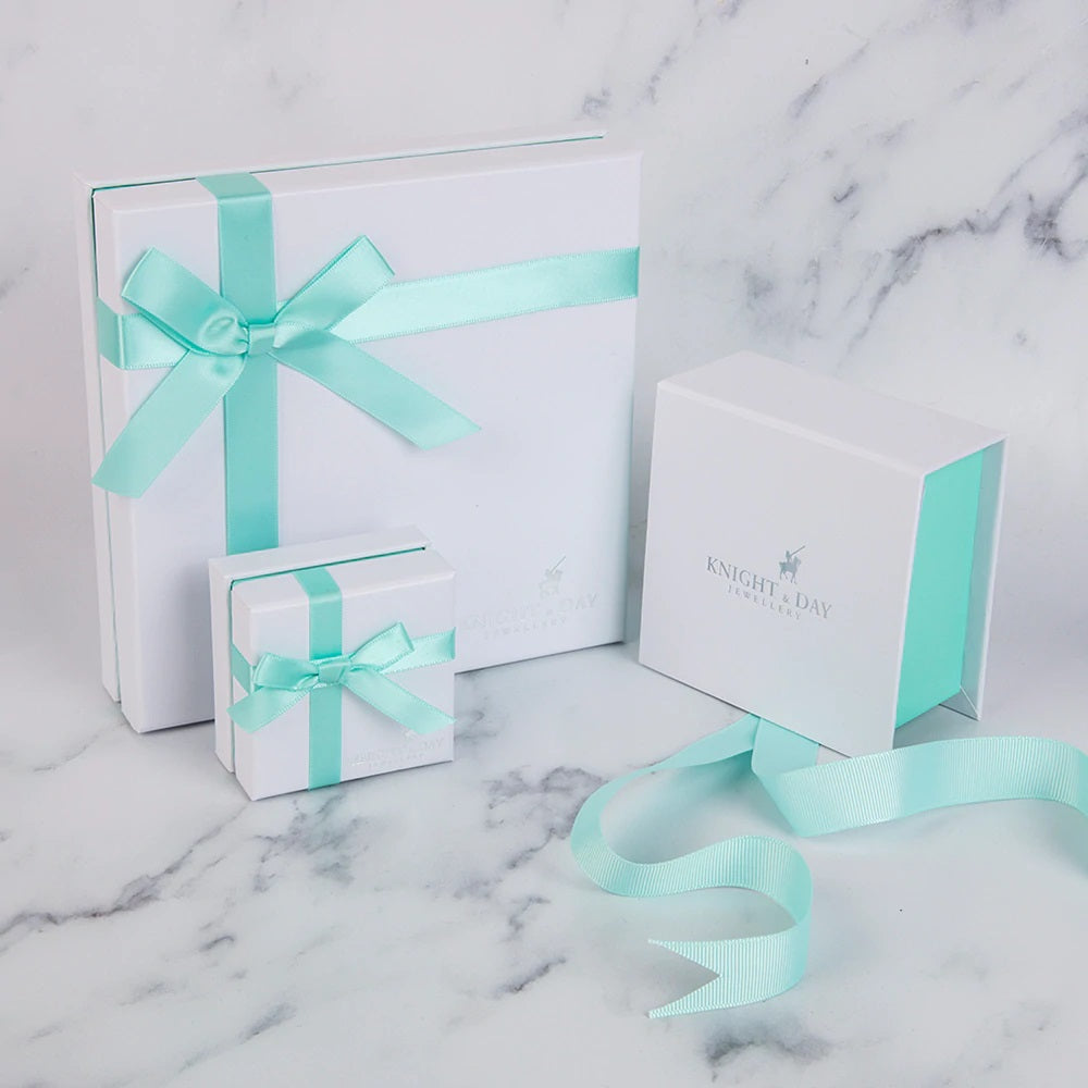 Knight & Day Nevaeh Rhodium Earrings Huggie style hoops (12mm) embellished with clear CZ stones. Rhodium plating.