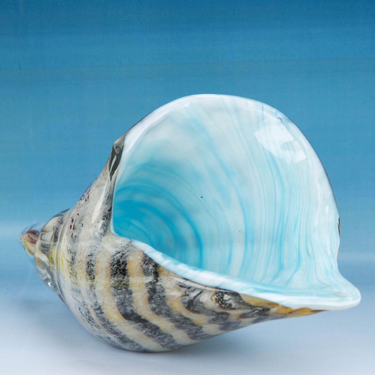 Objets Dart Glass Figurine - Shell A beautiful, large handmade glass conch shell ornament. From Objets d'Art - hand blown and one hundred percent unique.