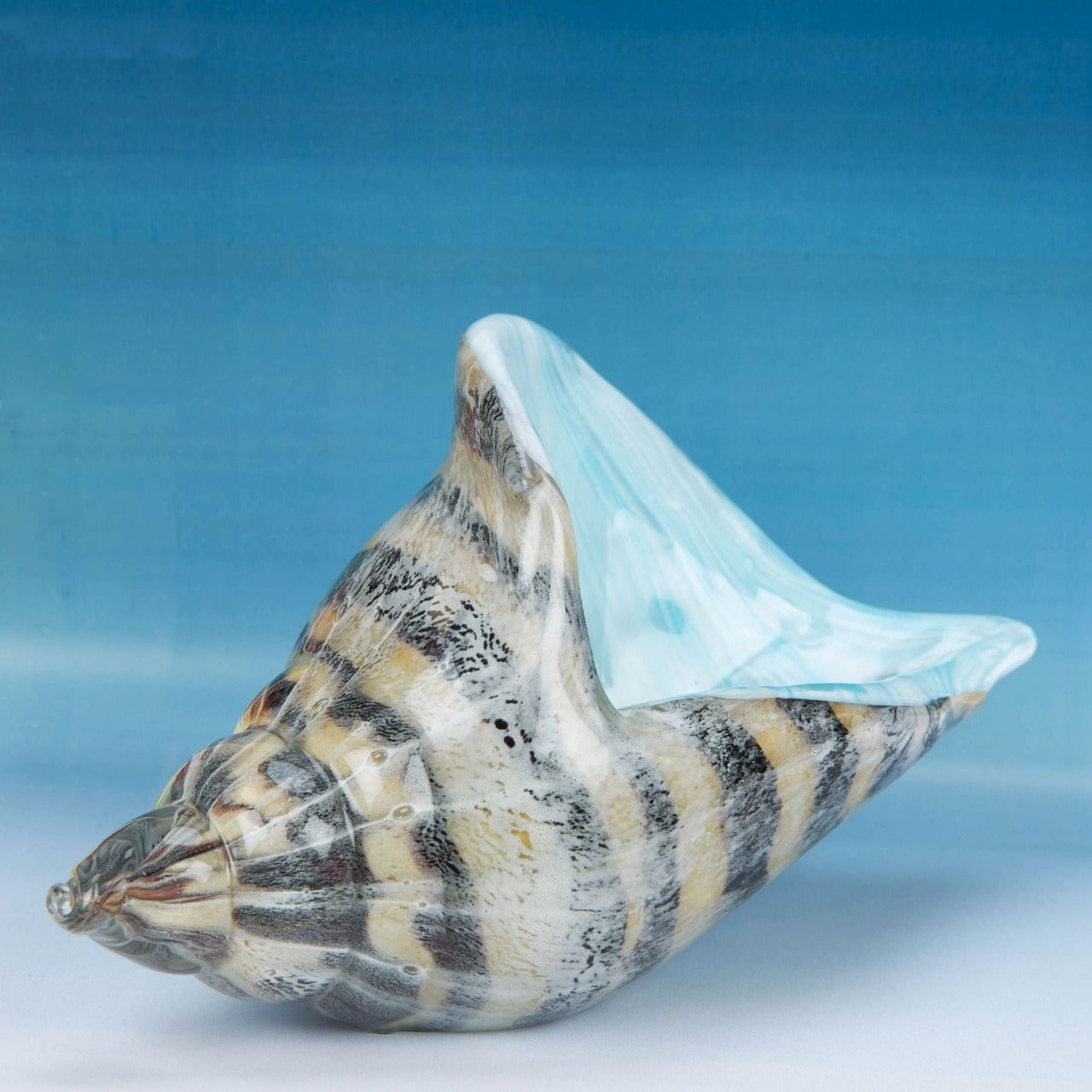 Objets Dart Glass Figurine - Shell A beautiful, large handmade glass conch shell ornament. From Objets d'Art - hand blown and one hundred percent unique.