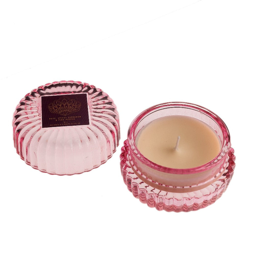 Opulence Rose, Spiced Cardamom & Pink Pepper Candle Inspired by the grace and unique beauty of the peacock, Opulence guarantees a majestical and serene Christmas. With contemporary bold night colours and embellished gold foils, these luxury gifts bring the fairy tale fantasy to life with their decorative textures and dazzling style.