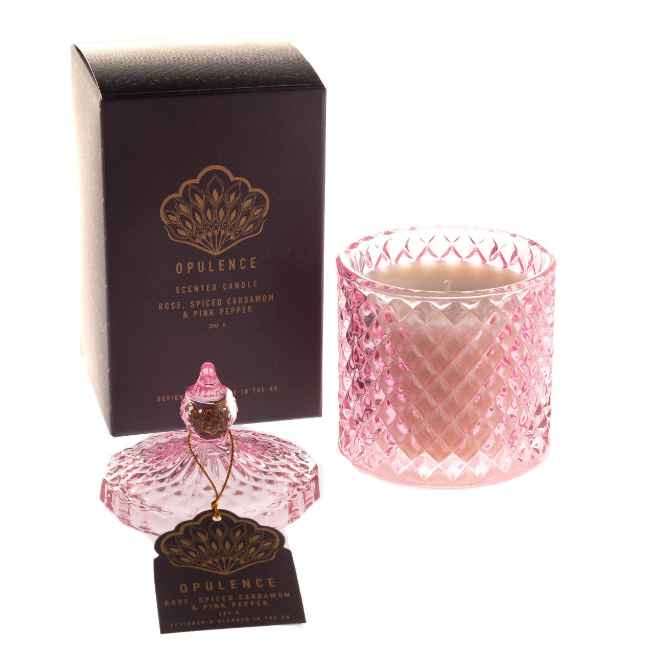 Opulence Rose, Spiced Cardamom & Pink Pepper Candle Jar Inspired by the grace and unique beauty of the peacock, Opulence guarantees a majestical and serene Christmas. With contemporary bold night colours and embellished gold foils, these luxury gifts bring the fairy tale fantasy to life with their decorative textures and dazzling style.