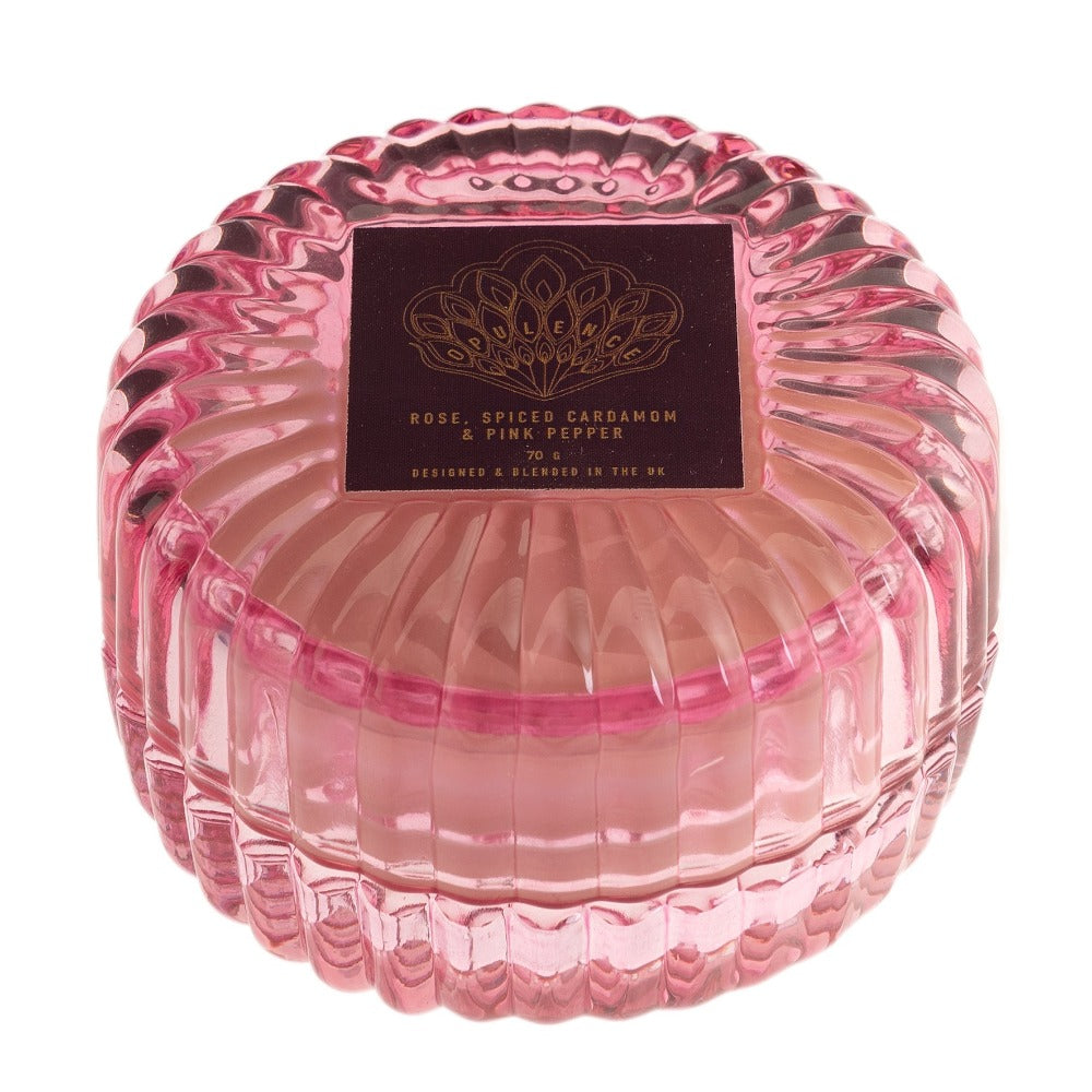 Opulence Rose, Spiced Cardamom & Pink Pepper Candle Inspired by the grace and unique beauty of the peacock, Opulence guarantees a majestical and serene Christmas. With contemporary bold night colours and embellished gold foils, these luxury gifts bring the fairy tale fantasy to life with their decorative textures and dazzling style.
