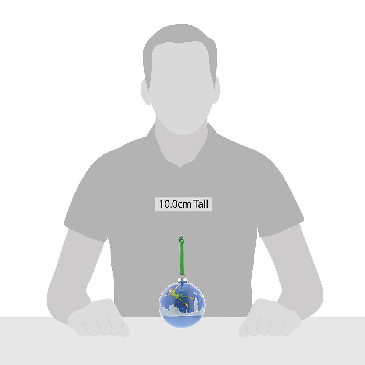 Disney Christmas Bauble Peter Pan You Can Fly Peter Pan flys above the silhouette of London with Wendy and the boys in this beautiful glass bauble. This treasured keepsake would make a lovely unique gift for a friend, or a self-purchase to brighten up the home. Presented in a branded window box.